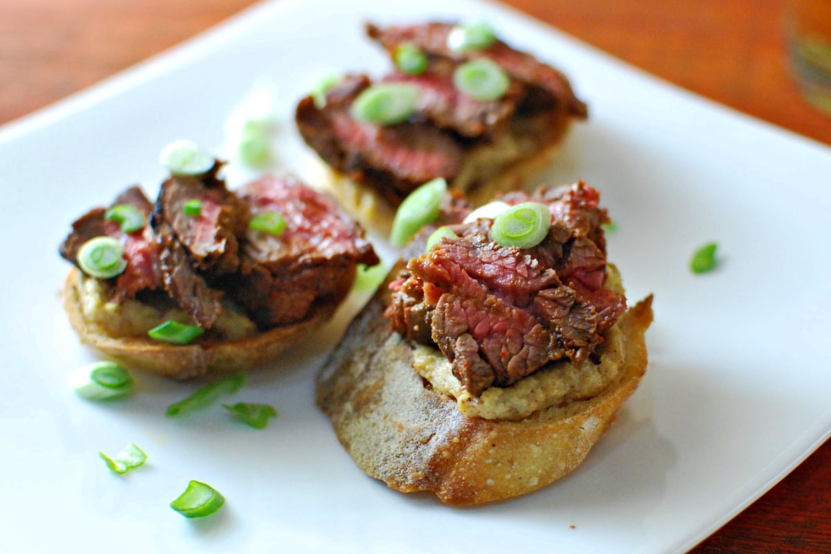 Red curry steak and cauliflower crostini