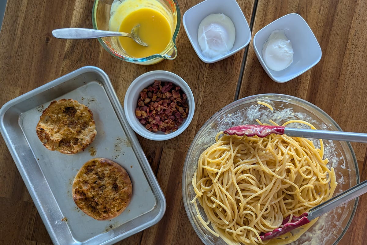 all the eggs benedict carbonara ingredients ready to build
