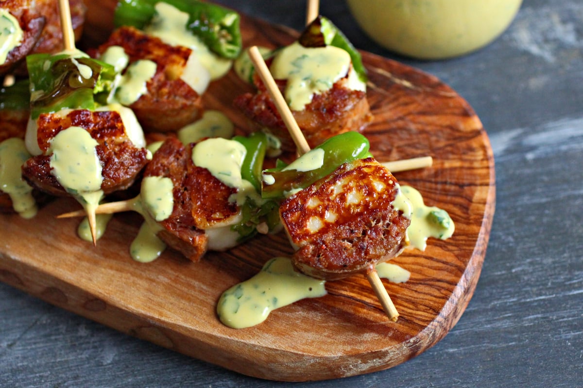Sausage, cheese, and shishito skewers